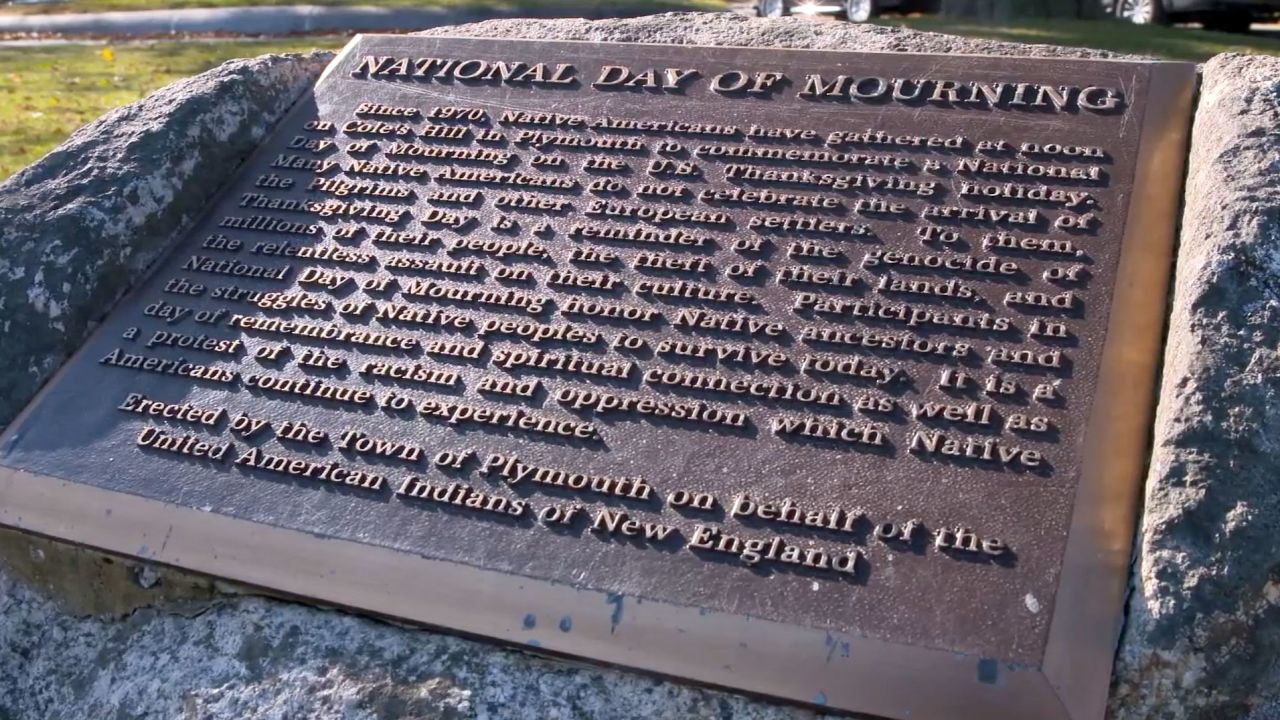 A plaque on Cole's Hill in Massachusetts recognizes the counter-commemoration on Thanksgiving.