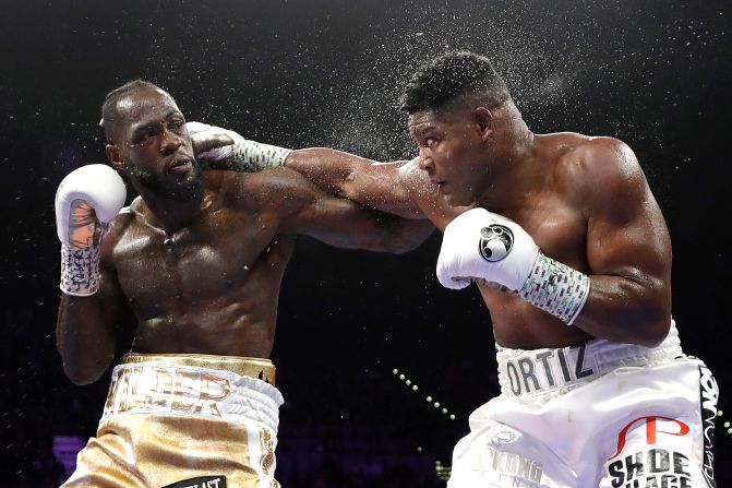 World Boxing Council heavyweight champion <a href="index.php?page=&url=https%3A%2F%2Fwww.cnn.com%2F2019%2F11%2F24%2Fsport%2Fdeontay-wilder-luis-ortiz-world-boxing-council-spt-intl%2Findex.html" target="_blank">Deontay Wilder trades punches</a> with Luis Ortiz during their title fight at MGM Grand Garden Arena on Saturday, November 23 in Las Vegas, Nevada. Wilder won with a seventh-round knockout.