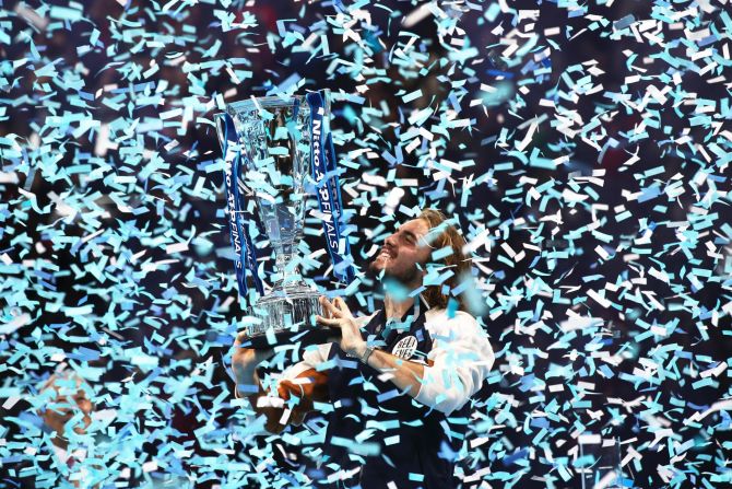Tennis pro Stefanos Tsitsipas lifts his trophy after <a href="https://www.cnn.com/2019/11/17/tennis/thiem-tsitsipas-atp-finals-tennis-spt-intl/index.html" target="_blank">winning the ATP World Tour Finals</a> on Sunday, November 17.
