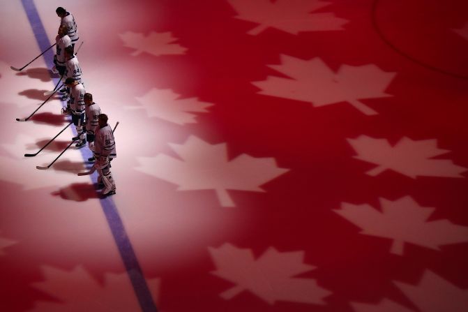The Toronto Maple Leafs stand attended for the Canadian national anthem before an NHL game against the Arizona Coyotes on Thursday, November 21 in Glendale, Arizona.
