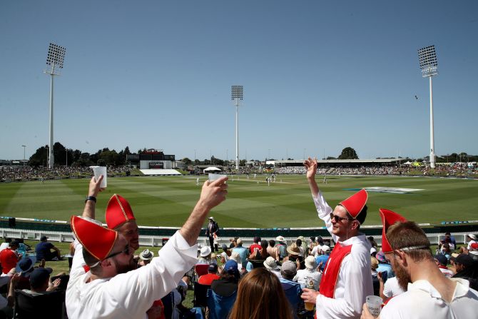 Cricket fans cheer on from the Bay Oval in Mount Maunganui, New Zealand, during day three of the first test match between New Zealand and England on Saturday, November 23.