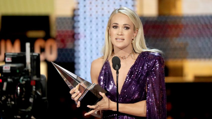 LOS ANGELES, CALIFORNIA - NOVEMBER 24: Carrie Underwood accepts the Favorite Album - Country award for 'Cry Pretty' and Favorite Female Artist - Country award onstage during the 2019 American Music Awards at Microsoft Theater on November 24, 2019 in Los Angeles, California. (Photo by JC Olivera/Getty Images)