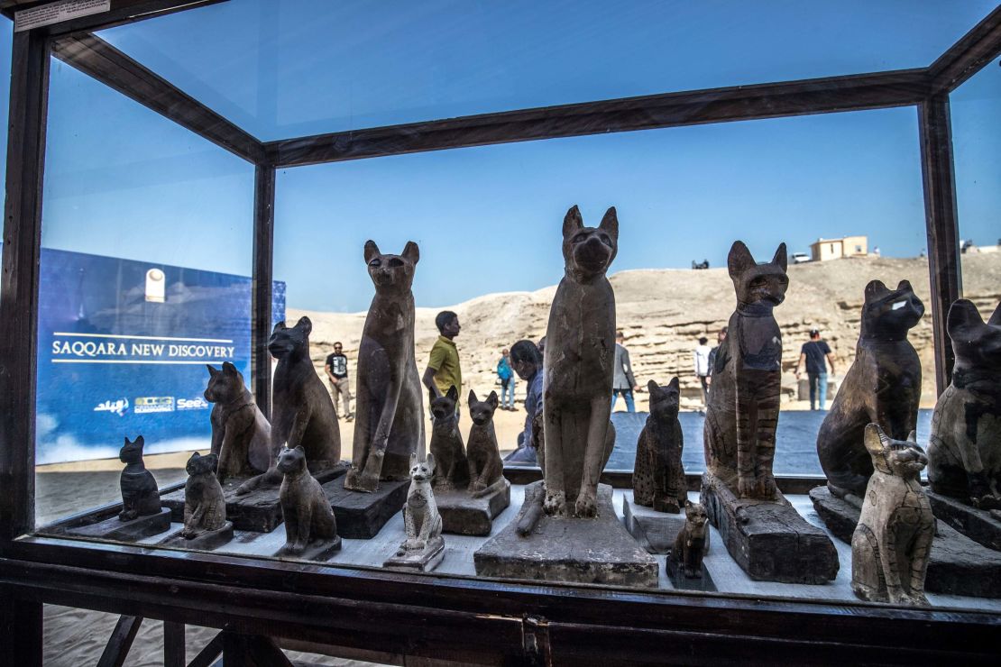 Statues of cats are displayed on November 23, 2019