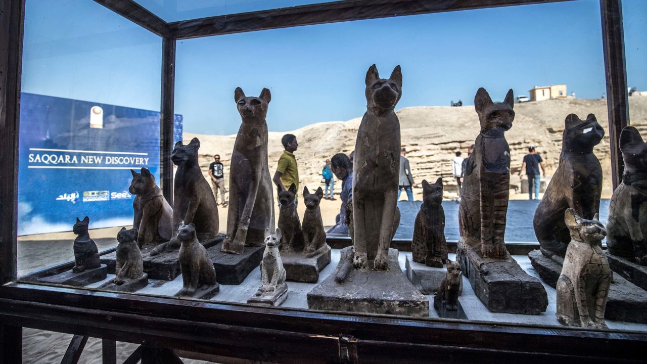 Statues of cats are displayed on November 23, 2019