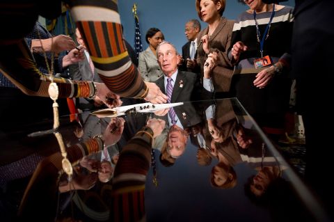Michael Bloomberg, as New York mayor, attends a bill-signing ceremony in January 2012.
