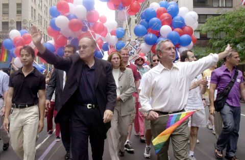 Bloomberg and New York Mayor Rudy Giuliani march in a gay pride parade in June 2001. Giuliani's two terms were just about up. Later that year, Bloomberg was elected as his successor.