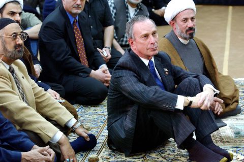 Bloomberg sits with Imam Sheikh Fadhel Al-Sahlani, right, as they listen to a speaker at the Inam Al-Khoei Islamic Center in New York in March 2003. Bloomberg told the Islamic Center congregation that New York City will not tolerate any illegal or discriminating acts toward Muslims.