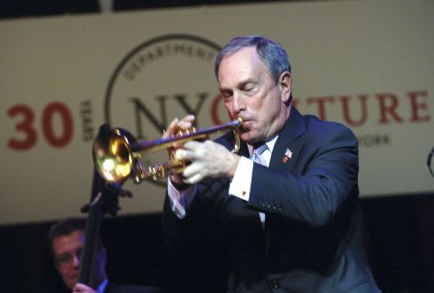 Bloomberg plays the trumpet as New York's Department of Cultural Affairs hosts its Mayor's Awards for Arts and Culture in 2006.
