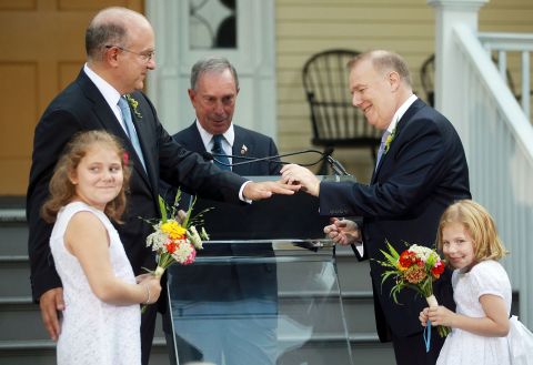 Bloomberg officiates the wedding of Jonathan Mintz, left, and John Feinblatt in July 2011. The longtime partners worked for Bloomberg at City Hall, and this was the first day that same-sex couples were allowed to legally marry in New York.