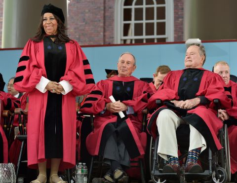 Singer Aretha Franklin, Bloomberg and former President George H.W. Bush receive honorary degrees from Harvard University in 2014.