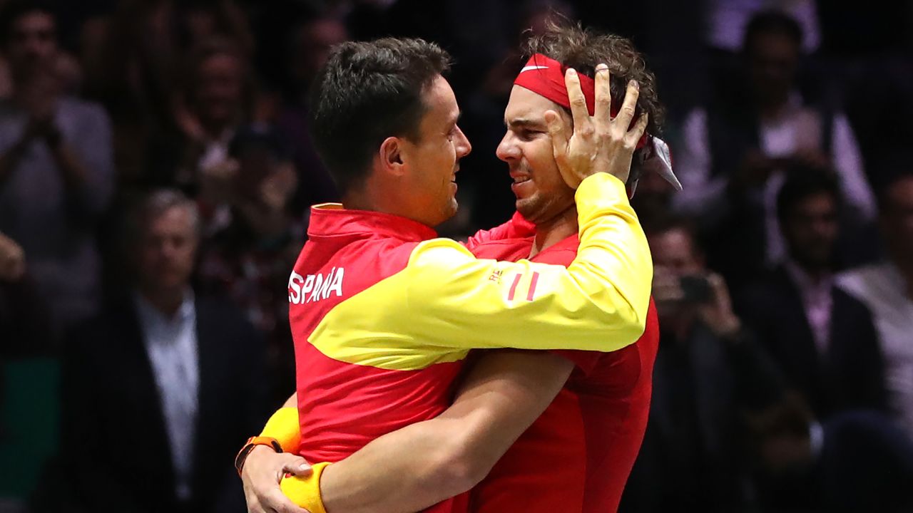 Rafael Nadal embraces teammate Roberto Bautista Agut, whose father passed away during the Davis Cup last week. 