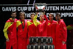 Roberto Bautista Agut lifts the trophy as Spain celebrate beating Canada in this year's Davis Cup. It is the sixth time they have won the title. 