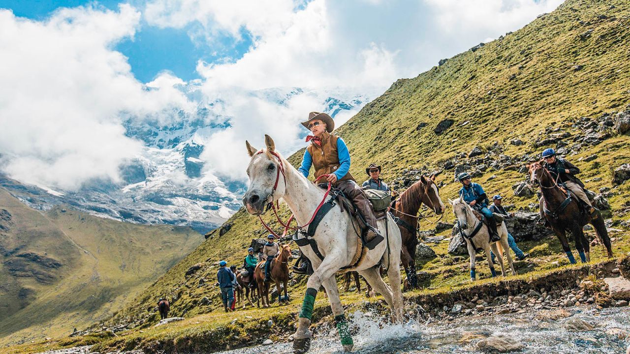 <strong>Mountain Lodges of Peru:</strong> Riding horseback to Machu Picchu is an unforgettable way to visit this ancient wonder. 