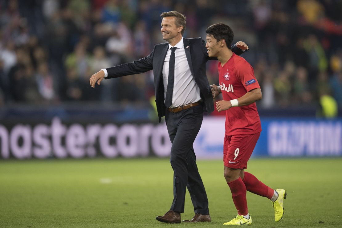 Marsch (L) celebrates with Hee-chan Hwang after Salzburg's 6-2 win over  Genk in the Champions League.