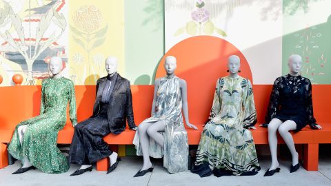 H&M displays dresses from its 2018 Conscious Exclusive collection. The retailer wants to be seen as a climate champion — but that sustainability mission is in direct tension with its fast fashion business model. (Stefanie Keenan/Getty Images for H&M)