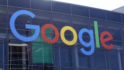 FILE - In this Sept. 24, 2019, file photo a sign is shown on a Google building at their campus in Mountain View, Calif. Google plans offer checking accounts run by Citigroup and a credit union, according to a report by The Wall Street Journal. (AP Photo/Jeff Chiu, File)