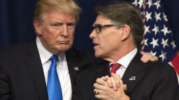 WASHINGTON, DC - JUNE 29:  (AFP OUT) U.S. President Donald Trump (L) embraces Energy Secretary Rick Perry after Trump delivered remarks on at the Unleashing American Energy event at the Department of Energy on June 29, 2017 in Washington, DC. Trump announced a number on initiatives including his Administration's plan on rolling back regulations on energy production and development.  (Photo by Kevin Dietsch-Pool/Getty Images)