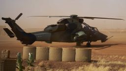 A Eurocopter Tiger (Eurocopter EC665 Tigre) helicopter (L) is seen at the French Military base in Gao, in northern Mali on November 8, 2019.