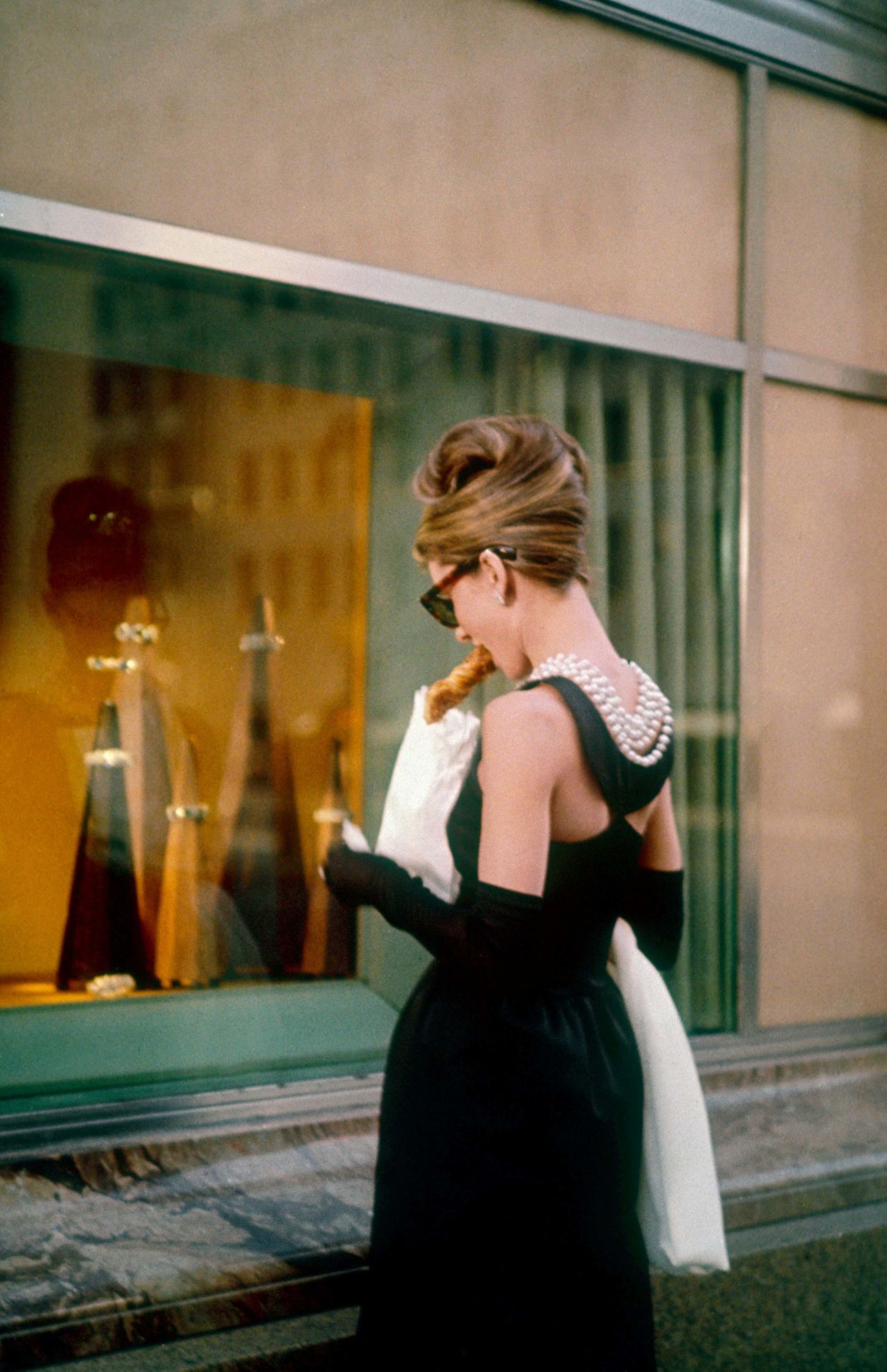 Audrey Hepburn's dress was designed by none other than Hubert de Givenchy, who worked on Hepburn's entire wardrobe for the movie "Breakfast at Tiffany's."