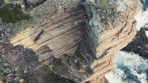 Dufton climbing the Old Man of Hoy.