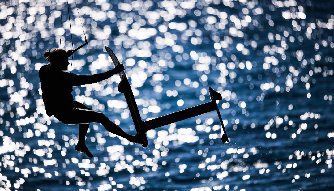 <strong> 7. Robert Hajduk. </strong>Athlete Blazej Ozog flies high on his foiling kiteboard off Tawila Island, Egypt. 