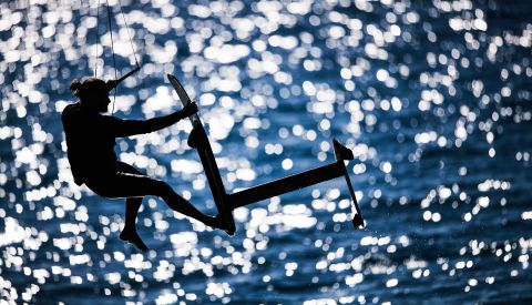 <strong> 7. Robert Hajduk. </strong>Athlete Blazej Ozog flies high on his foiling kiteboard off Tawila Island, Egypt. 