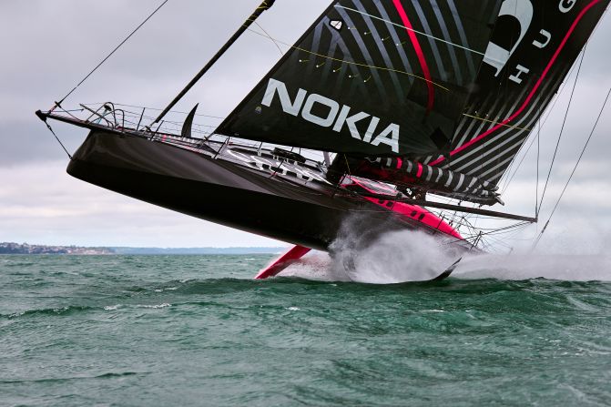 <strong> 9. Graham Snook. </strong>Alex Thomson's Hugo Boss boat flies on her foils during testing in strong winds off Portsmouth, UK.