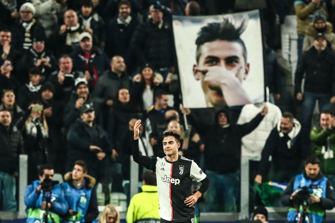 Paulo Dybala celebrates after opening the scoring against Atletico Madrid in the Champions League.