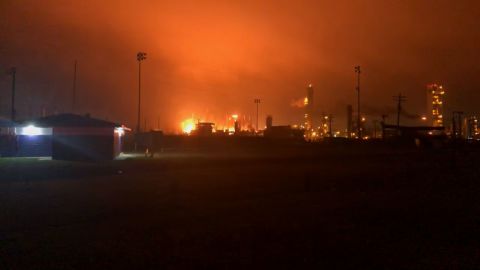Fire illuminates the sky after a blast at a chemical plant in Port Neches, Texas.