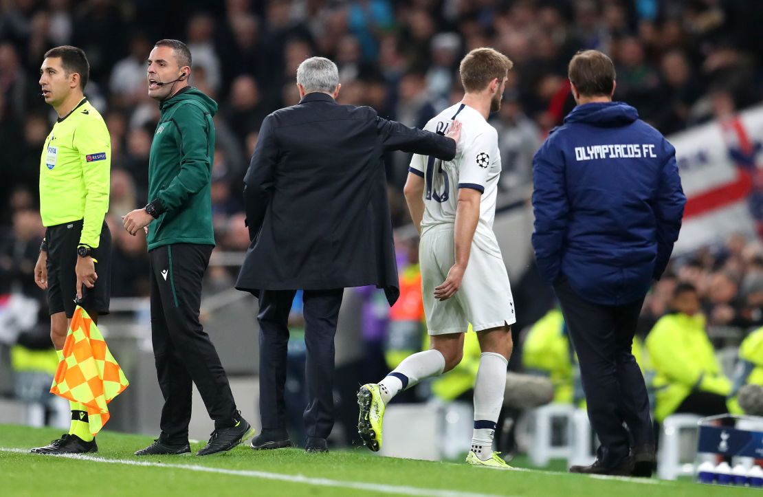 Jose Mourinho pats Eric Dier as he is substituted off. 