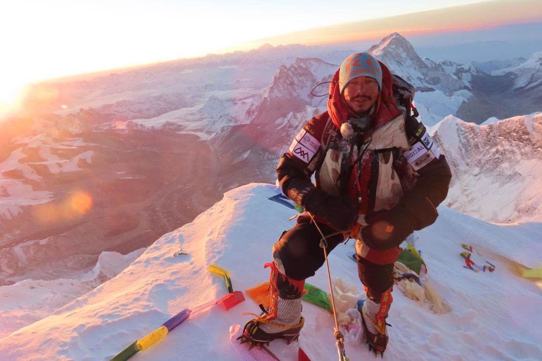 Previous record holder Nirmal Purja at the summit of Mount Everest.