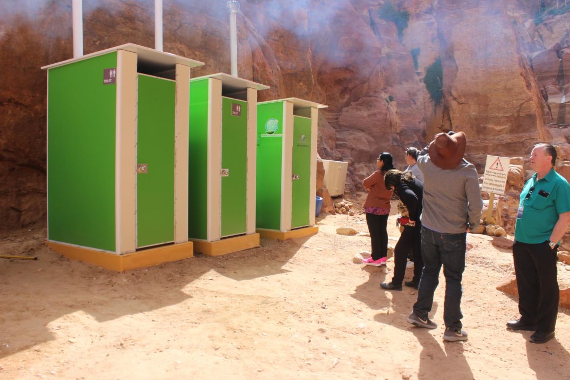 Tourists queue outside EcoLoo cubicles at Petra, Jordan. The UNESCO World Heritage acquired the units in 2016, with local media reporting that fertilizer produced by the toilets was used in plant nurseries. 