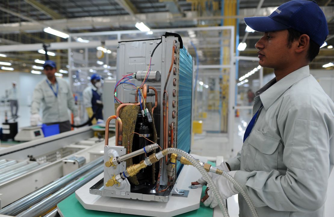 An air conditioning unit is assembled at a factory in Jhajjar, India.