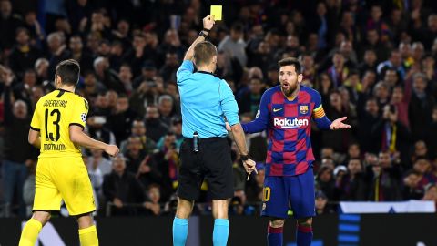 Messi receives a yellow card for diving on an historic night for the Argentine.