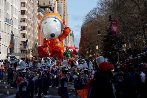 Astronaut Snoopy makes its way down New York's Central Park West.