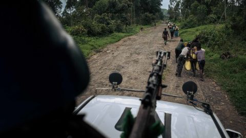 A UN peacekeeper patrols in DRC's North Kivu province, where many armed groups operate and regularly attack villages. 