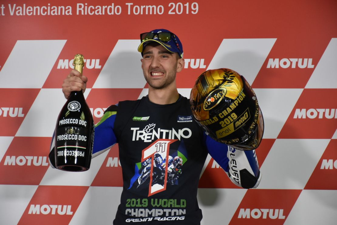 Matteo Ferrari celebrates winning the inaugural MotoE title.