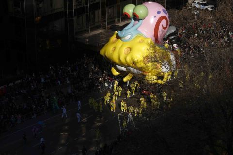 A "SpongeBob SquarePants" balloon catches a beam of light.