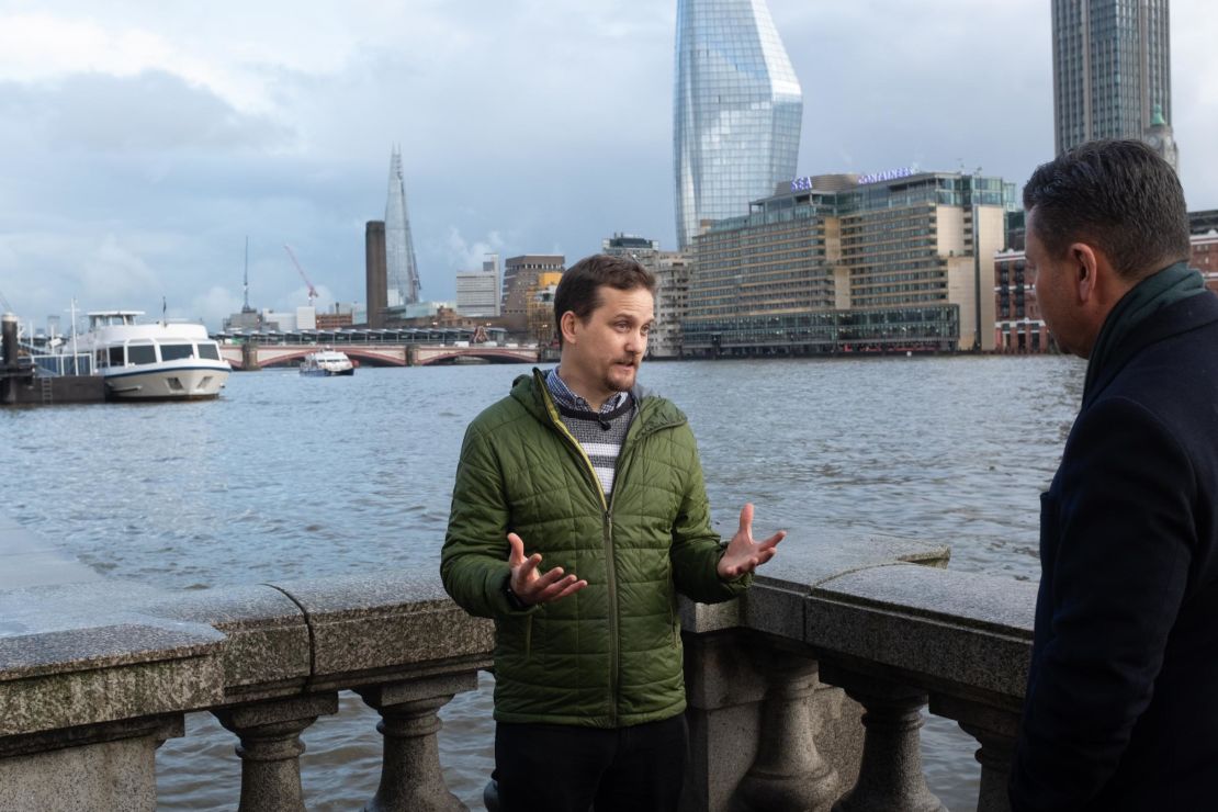 The oceanographer Ivan Haigh speaks to CNN along the River Thames.