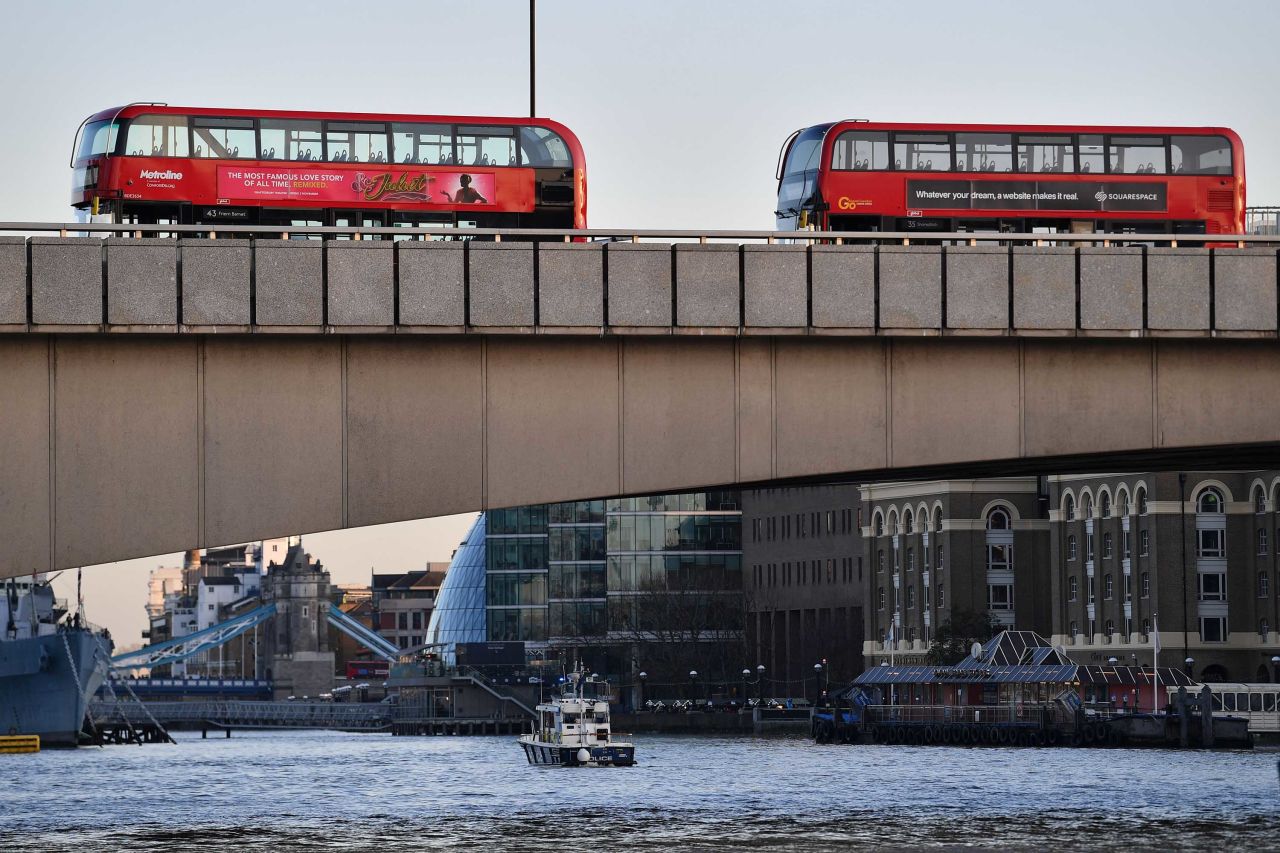 Empty buses are seen parked on London Bridge.