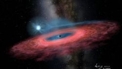 An artist's rendition of the accretion of gas onto a stellar black hole from its blue companion star.