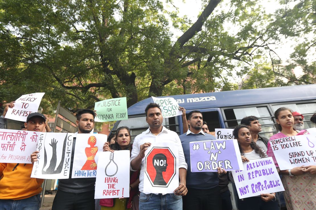 Protesters in New Delhi hold a demonstration on Friday demanding justice after the rape and murder case of the veterinarian in Hyderabad.