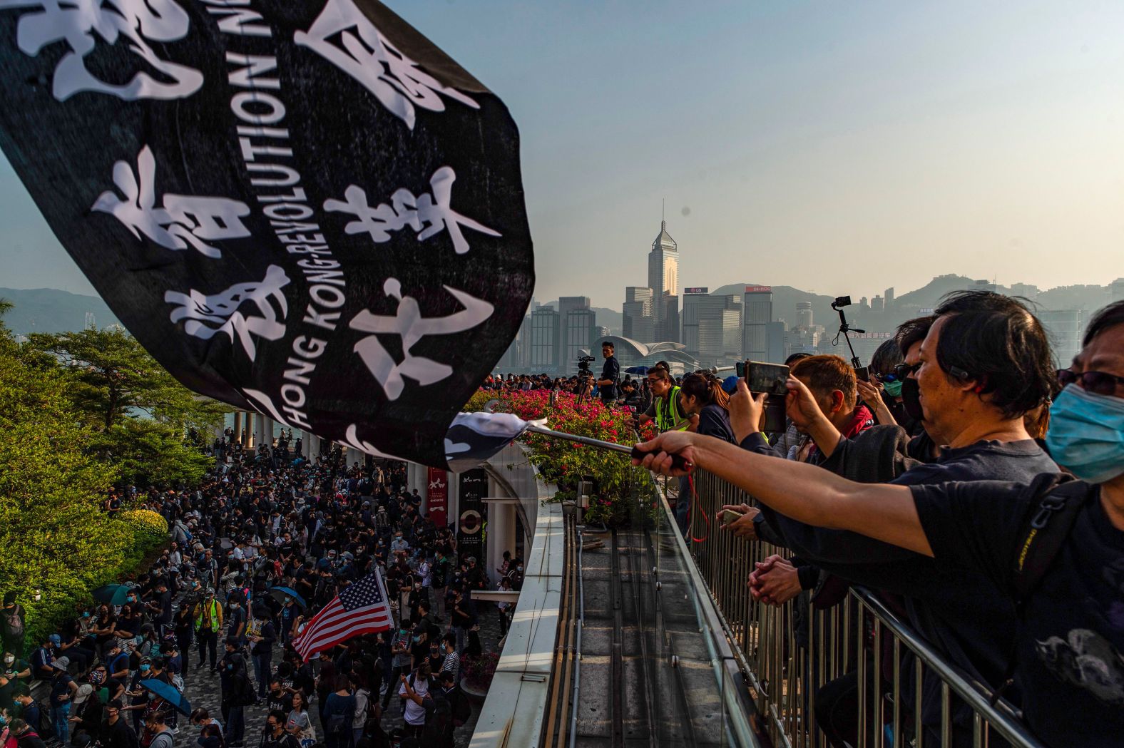 People take part in a march from Tsim Sha Tsui to Hung Hom in Hong Kong on December 1.