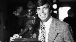 Pat Sullivan poses with his Heisman Trophy, Dec 2, 1971, after the presentation at the Downtown Athletic Club in New York. (AP Photo/Anthony Camerano)