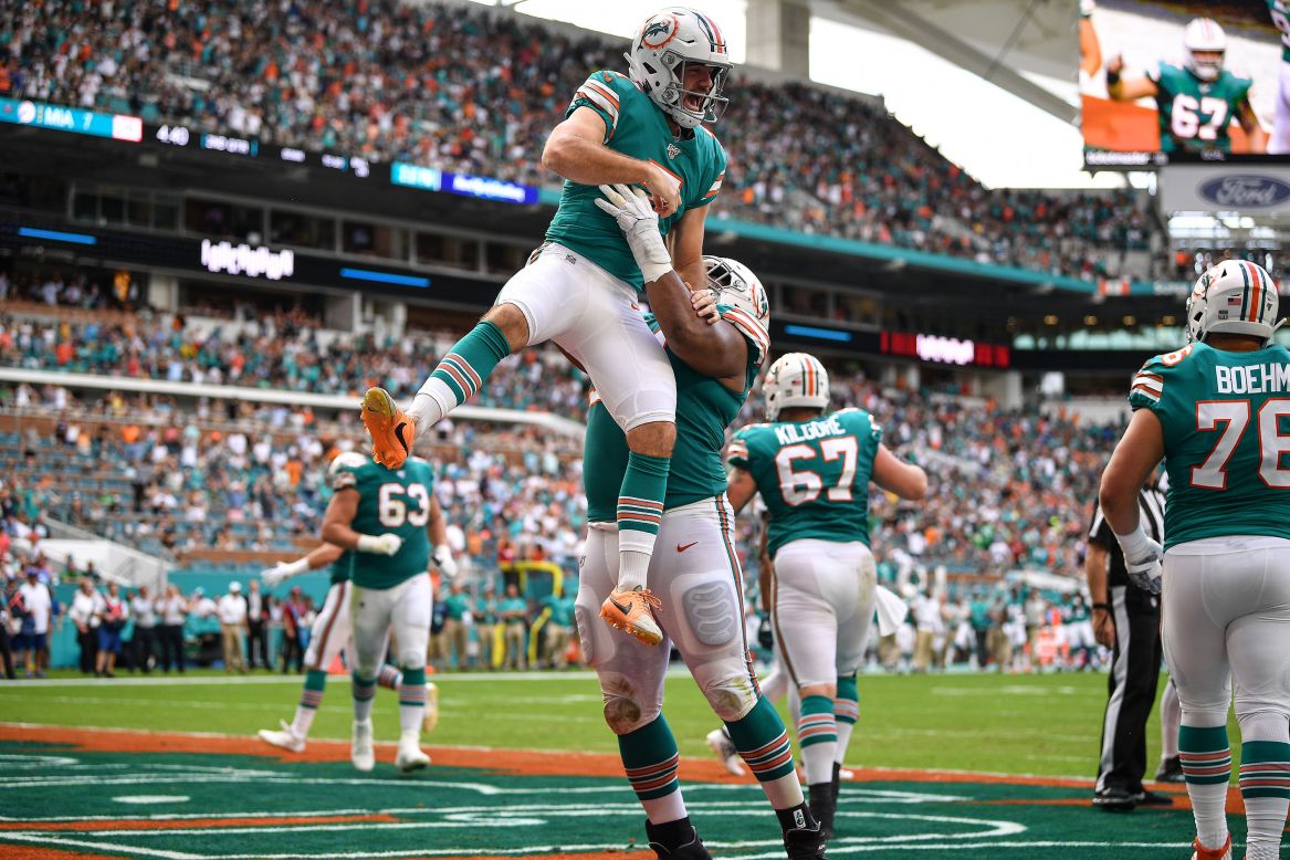 Jason Sanders of the Miami Dolphins celebrates a touchdown pass from a fake field goal against the Philadelphia Eagles at Hard Rock Stadium in Miami on December 1.