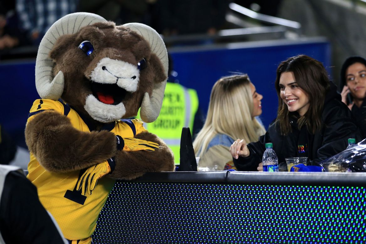 Mascot Rampage of the Los Angeles Rams jokes with Kendall Jenner during a game against the Baltimore Ravens at Los Angeles Memorial Coliseum on November 25, 2019.