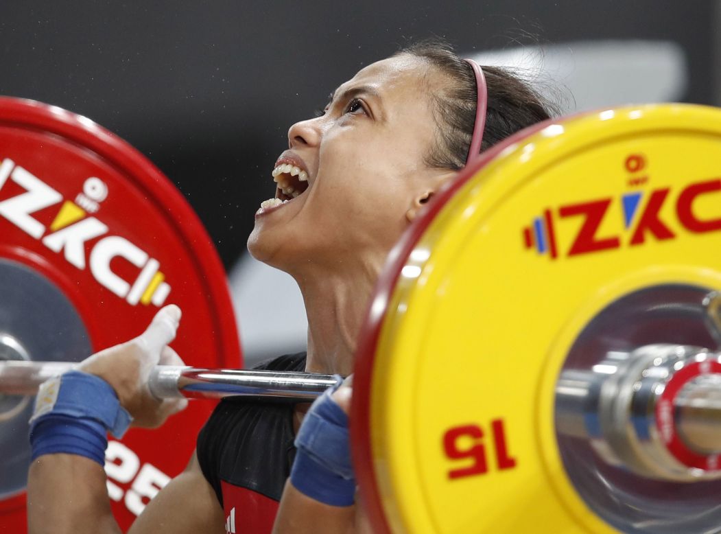 Indonesian weightlifter Lisa Setiawati competes in the 45kg women's clean and jerk competition during the SEA Games 2019 in Manila, Philippines, on December 1.