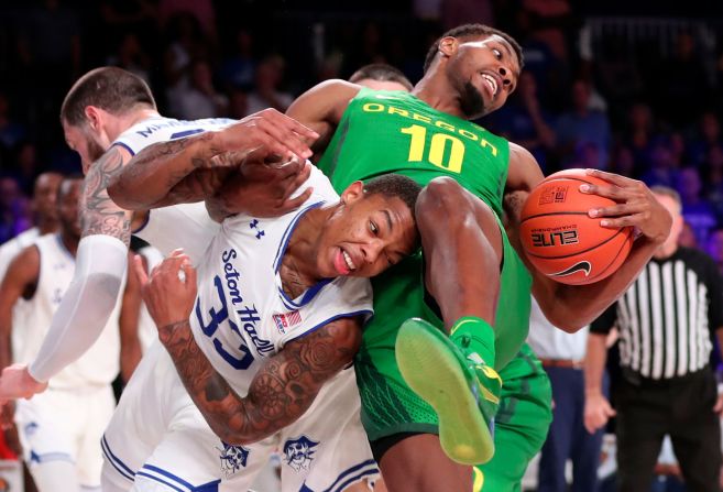 Oregon Ducks forward Shakur Juiston grabs a rebound past Seton Hall Pirates guard Shavar Reynolds at Imperial Arena. 