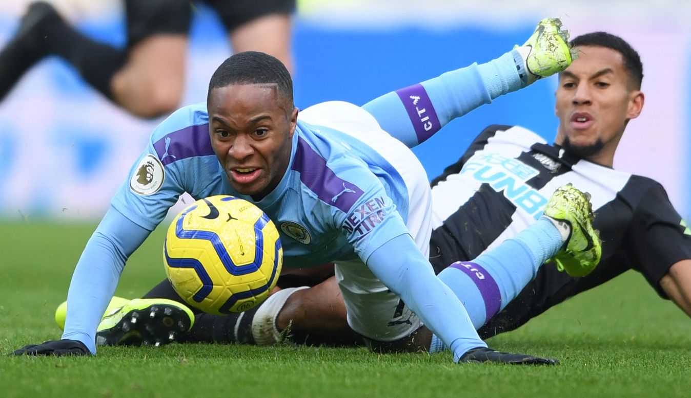 Manchester City player Raheem Sterling is challenged by Isaac Hayden during the Premier League match between Newcastle United and Manchester City at St. James Park on November 30.