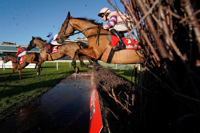 Harry Skelton riding Oldgrangewood clears the water on their way to winning The Get Your Ladbrokes ￡1 Free Bet Today Handicap Chase at Newbury Racecourse in Newbury, England, on November 29. 